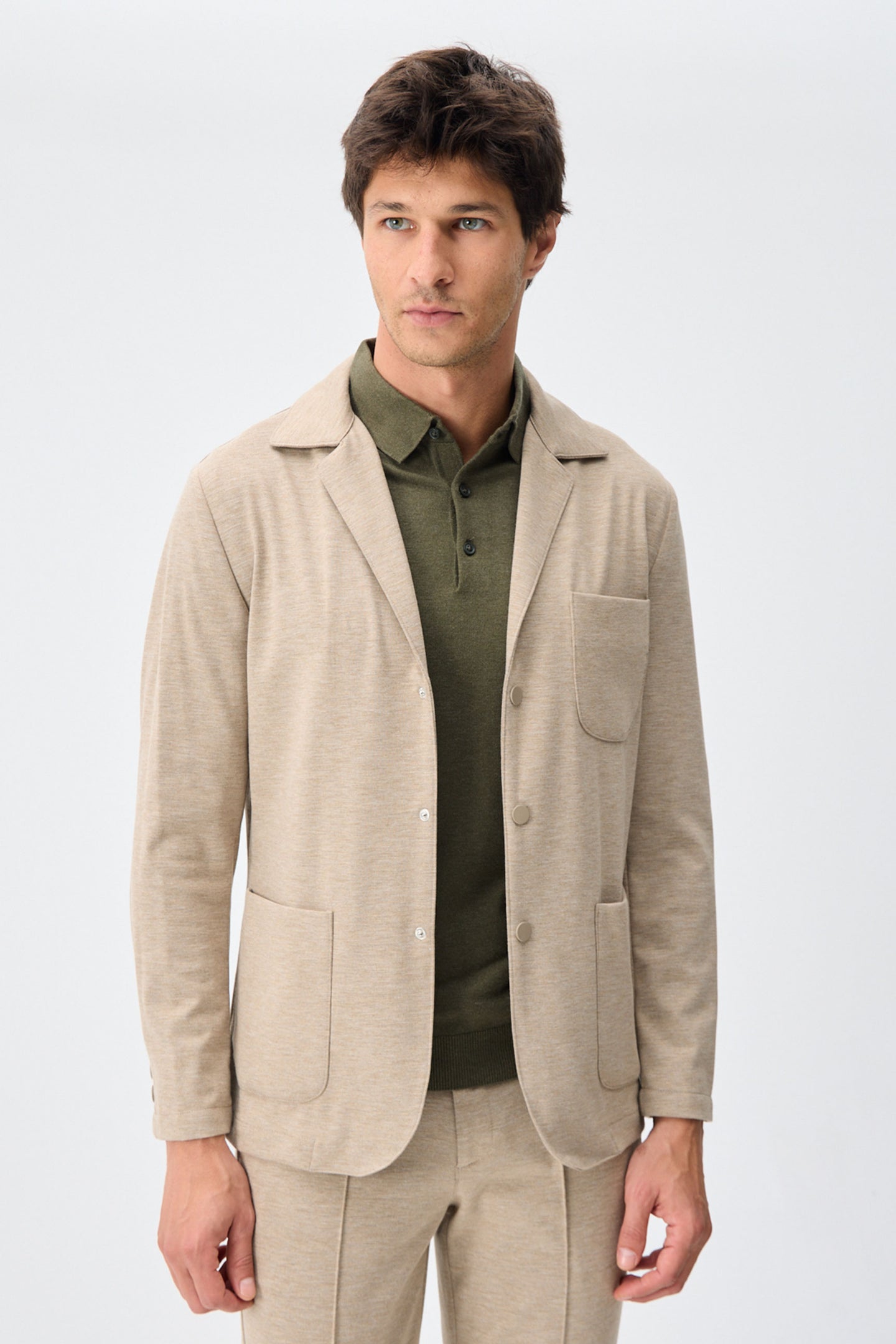 Beige zacht jersey smart casual pak voor heren: blazer en broek.