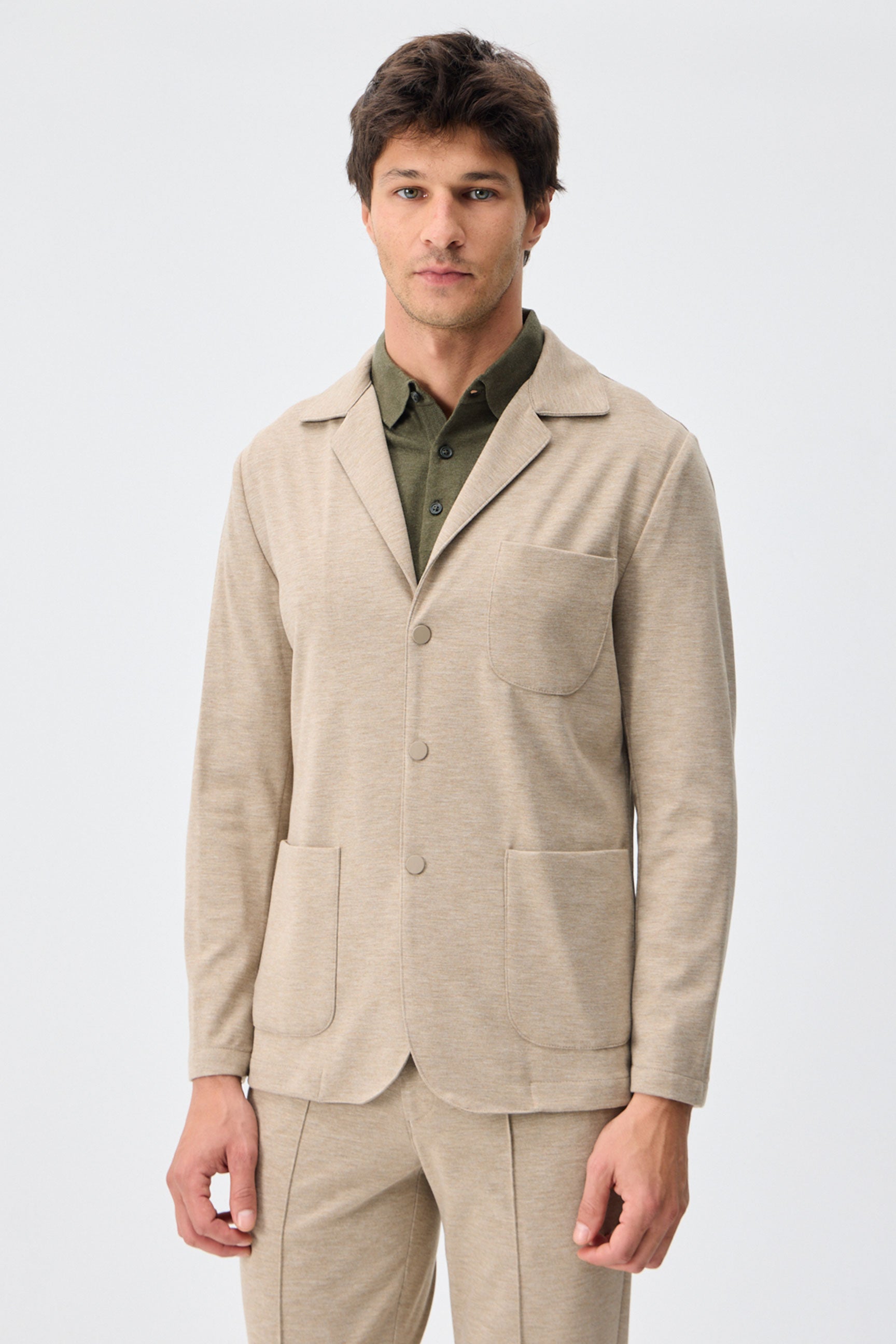 Beige zacht jersey smart casual pak voor heren: blazer en broek.