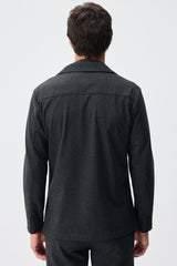 Herenpak bestaande uit een blazer en een broek van zachte, antracietkleurige jersey in smart casual stijl.