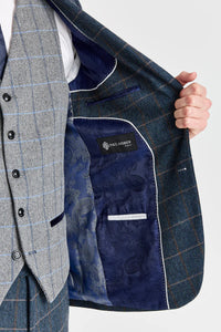 Harris marineblauwe tweedpak met Harris contrasterend grijs tweedvest.