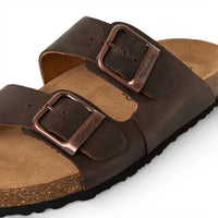 Bruine leren instapslippers voor heren met voetbed.