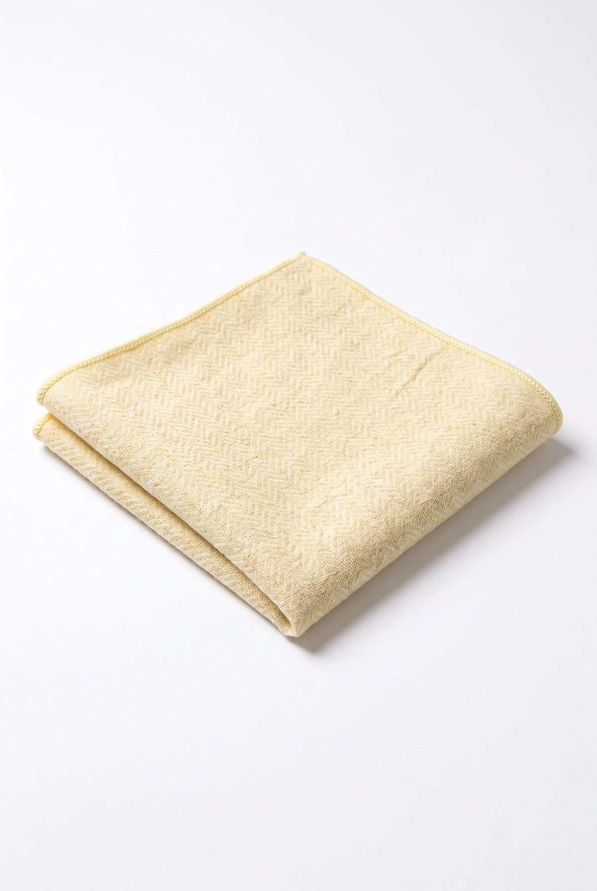 Champagnekleurige tweed pochet voor heren, gemaakt van een wolmix.