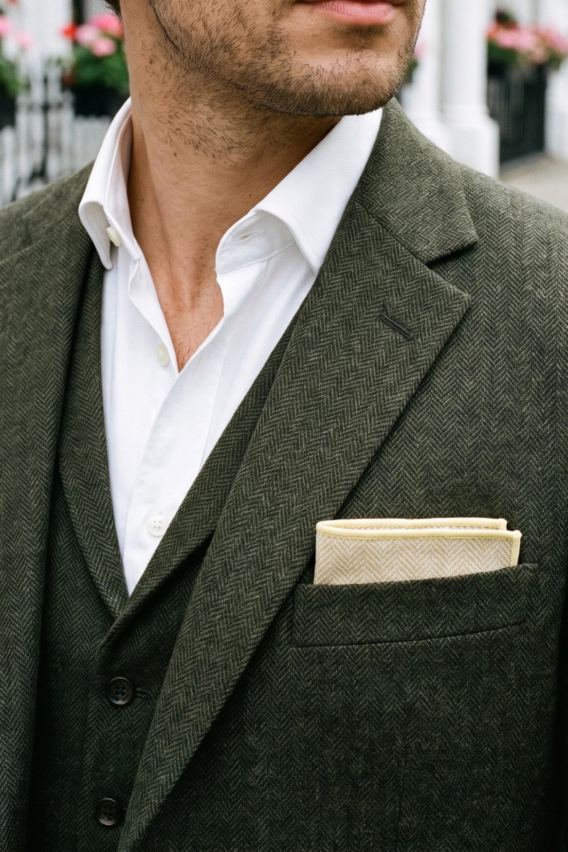 Champagnekleurige tweed pochet voor heren, gemaakt van een wolmix.