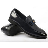 Heren loafers met textuur aan de voorkant en iconische gesp en strik